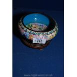 A Cloisonné Bowl with profuse floral decoration on wooden stand,