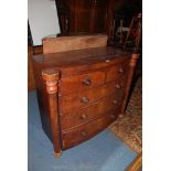 A Victorian mahogany bow front Chest of two short over three long graduated Drawers having
