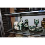 A quantity of pottery including Newlyn Celtic pottery mug, trays together with vases, trays,