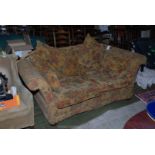 A modern Knoll style two seater Sofa having double drop arm,