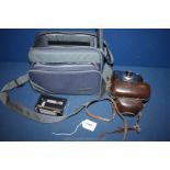 A Town & Country blue canvas camera bag containing a Zeiss Ikon Continette camera ,