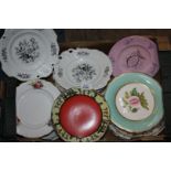 A large box of assorted plates to include Wedgwood,