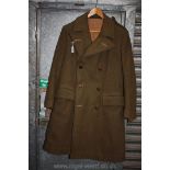 A khaki great Coat with leather buttons
