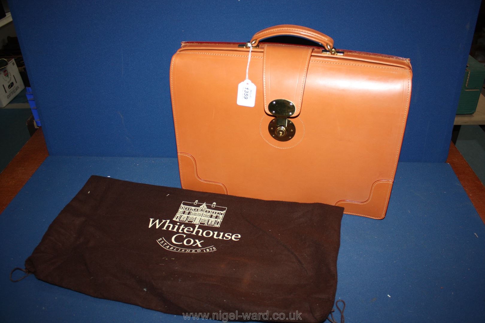 A traditional style Bridle hide top frame English Briefcase in tan by Whitehouse Cox & Co.