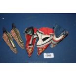 Two pairs of coloured silk embroidered Chinese ladies Shoes and one odd shoe