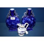 An 1840's Minton Amherst Japan pattern cream Jug and a pair of 1890's Lancing, England Moon Flasks,