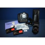 A Canon EOS 1 35mm Auto focus SLR Camera with instructions,