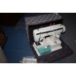 A canvas cased Jones 1681 electric Sewing machine with instructions, etc.