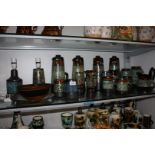 A quantity of Celtic Newlyn pottery including four lidded jugs, two lamp bases,