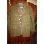 A Royal Artillery khaki Jacket with leather buttons