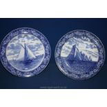 A pair of Wedgwood, Etruria blue and white plates depicting sailing ships, 10" diameter.