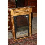 A rectangular wall Mirror with carved gilt frame