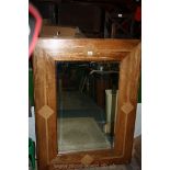 A large contemporary, bevel plate Mirror with mixed wood frame,