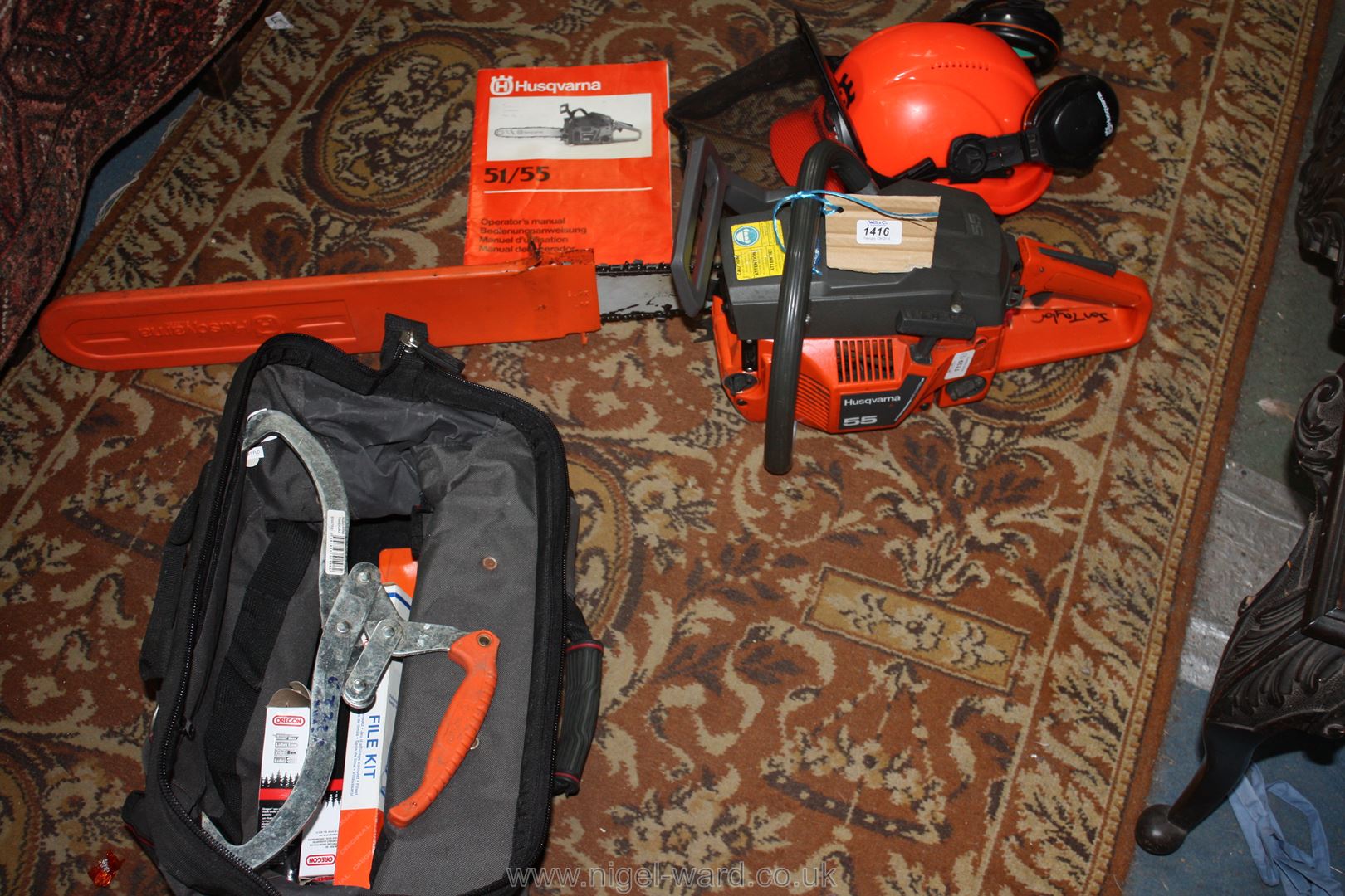 A Husqvarna 55 petrol-engined Chainsaw having 16" cutter-bar,