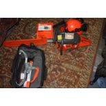 A Husqvarna 55 petrol-engined Chainsaw having 16" cutter-bar,