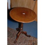 A Victorian Oak Circular ribbon twist tray top Pedestal Tripod Table,