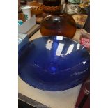 A brown oval studio glass Vase and a large blue glass Bowl