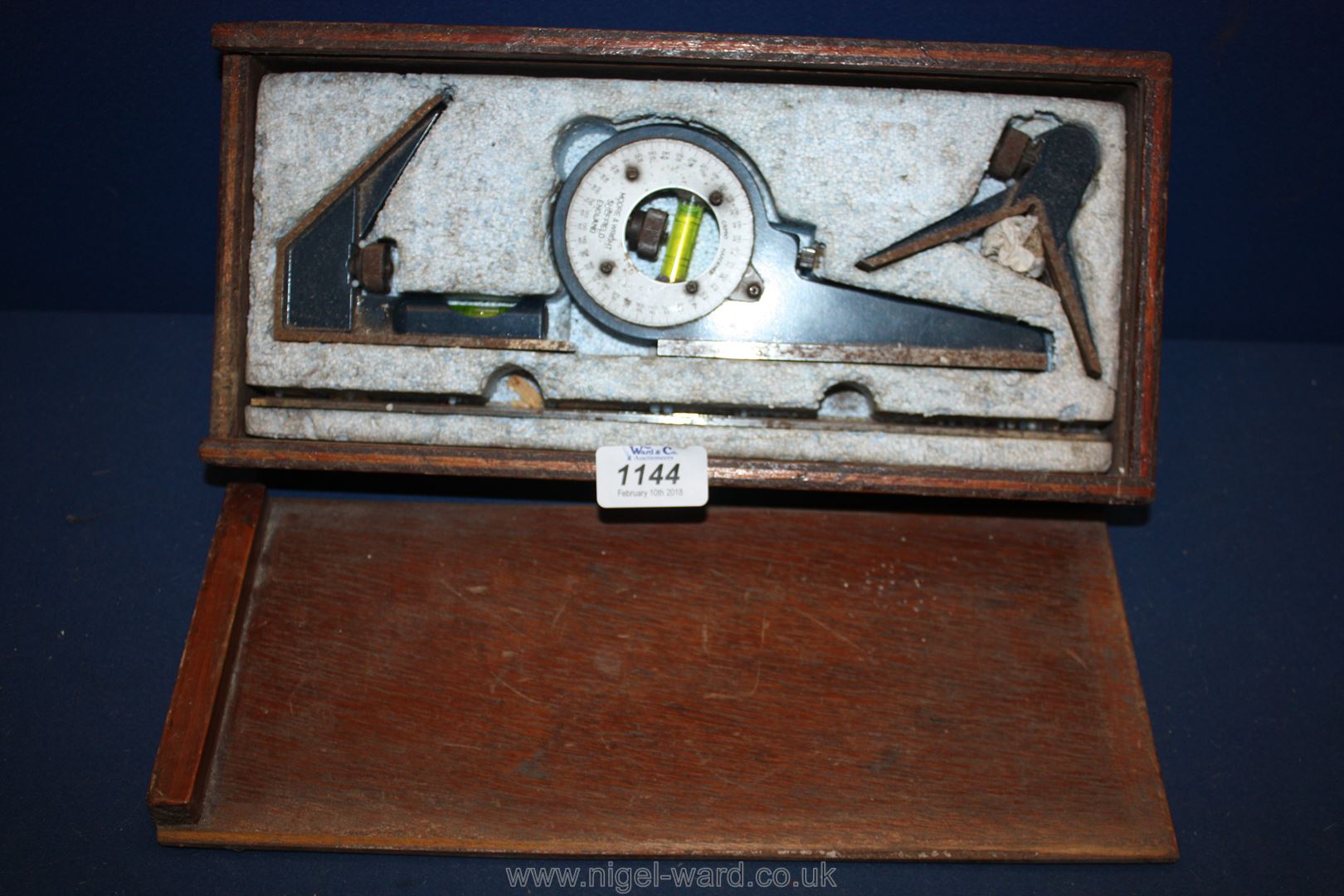 A vintage boxed Moore & Wright, Sheffield combination protractor, set square set.