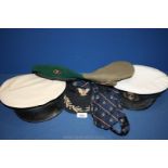 A quantity of Military Cap and Berets including green beret, naval cap, etc.