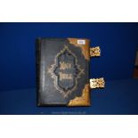 A leather and gilded detailed and buckled bound Family Bible edited by the late Rev.