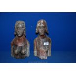 A pair of carved wood African tribal figures of half length, 11 1/2'' x 12'' tall approx.