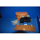 A pair of cased Binoculars,