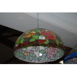 A Tiffany style domed Light-shade colourfully depicting flowers, foliage and butterflies,