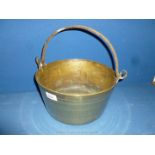 A large Brass Preserving Pan with iron swing handle.