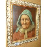 An ornately framed Oil on board depicting an elderly Dutch Lady with metal framed glasses,