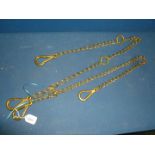 Two Brass harness Chains with swivels.