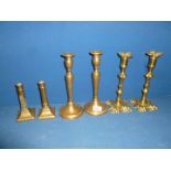 Three pairs of early Brass Candlesticks including round base, small pillar and shell base.