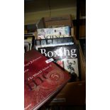 Box of books: boxing, wine,