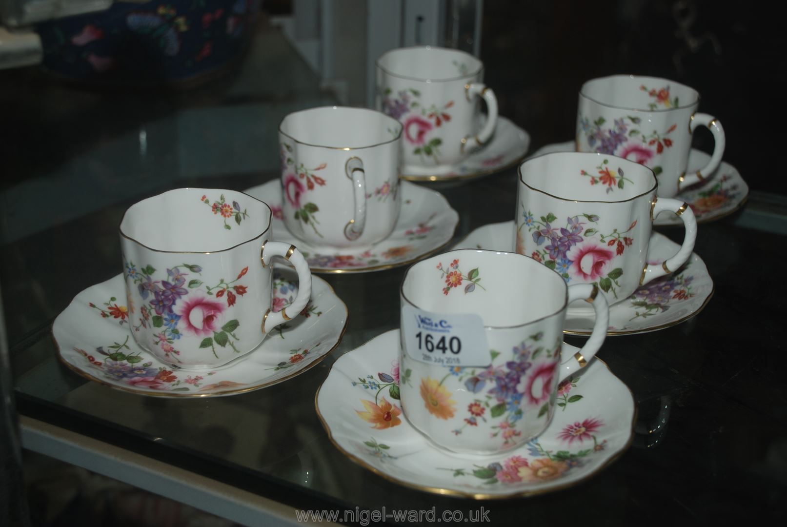 Six Royal Crown Derby ''Derby Posies'' pattern coffee Cups and saucers