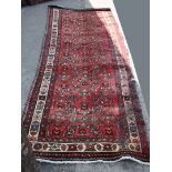 A 100% wool Persian fine Hamadan red ground Runner (a/f),