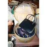 A vintage overnight case with label for Kenya and contents including hats, cuffs, handbag,