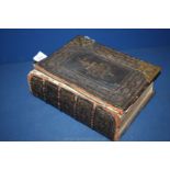 A ''The National Family Bible'' a/f with brass clasps and corners and having illustrations,