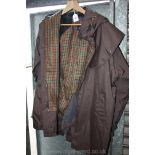 A Jack Murphy brown hooded rain coat,