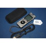 An Olympus DM-650 Digital Voice Recorder with pouch case and USB Cable