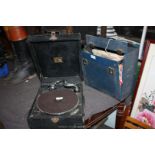 A HMV portable gramophone and a large quantity of 78 rpm records.