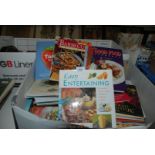 A box of Cookery books.