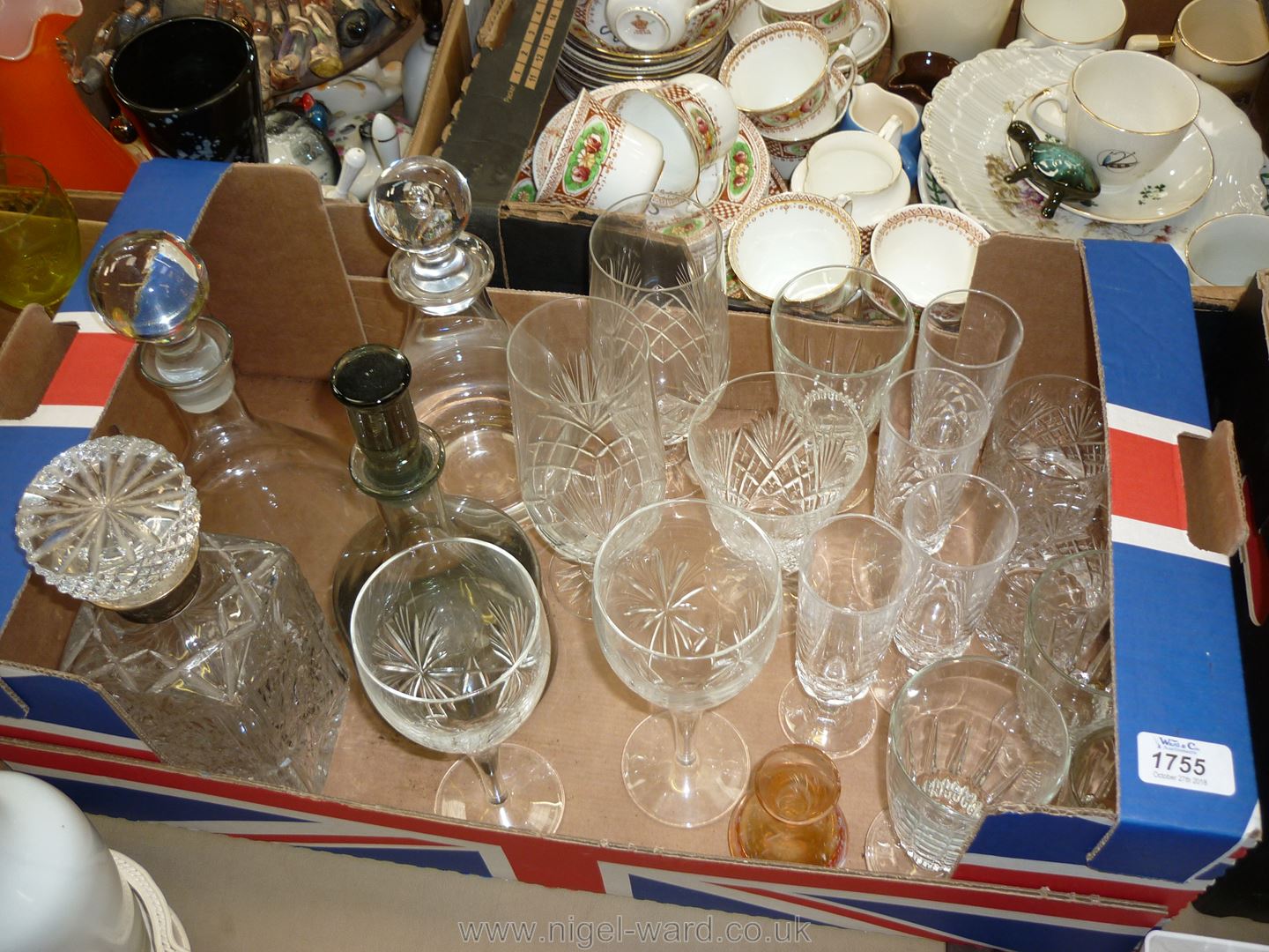 A quantity of glass including decanters (one with silver collar),