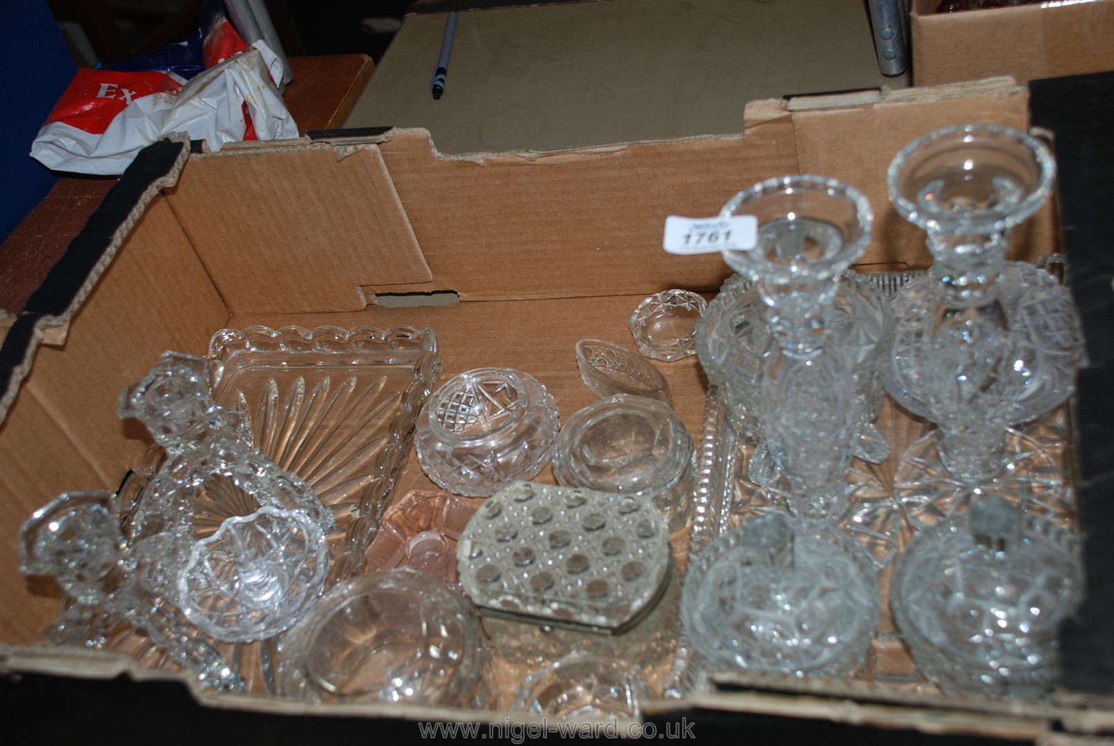 A quantity of glass dressing table trays, candlesticks, lidded pots, etc.