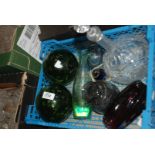 A box of glass including decanter, vases and paperweights.