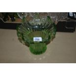 A green glass fluted Vase with water splash effect rim.