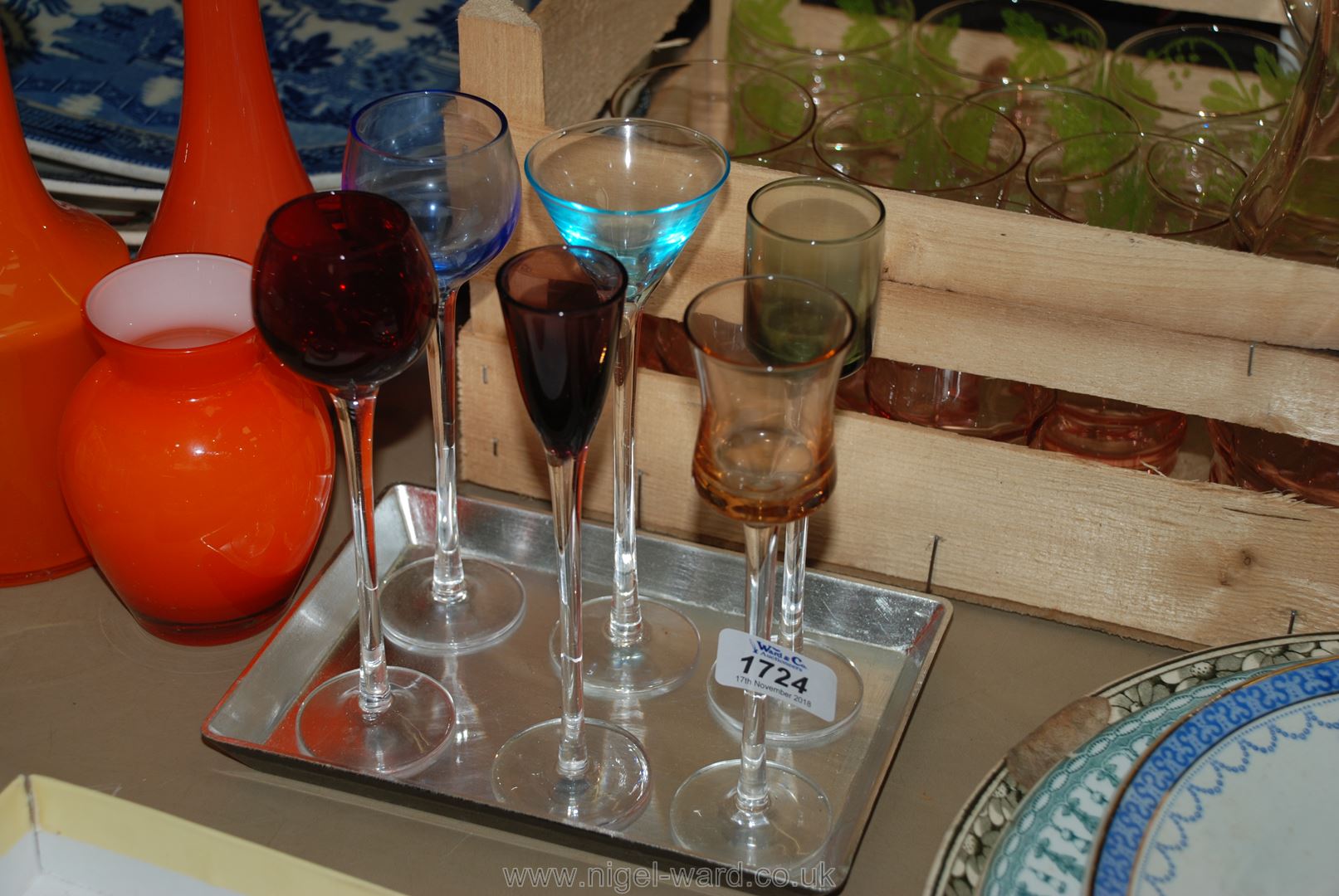 Six tall stemmed and coloured liqueur Glasses