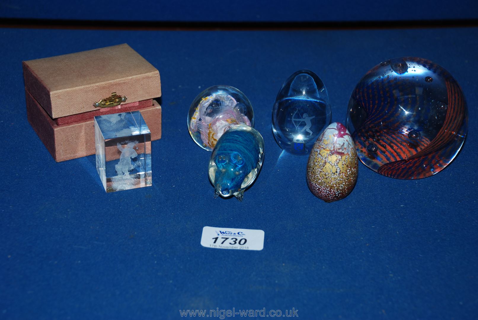 Five glass Paperweights including two Isle of Wight.