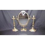 BRASS MIRROR AND A PAIR OF CANDLESTICKS