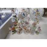 NINE CONTINENTAL PORCELAIN FIGURES