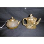 TWO CEREMONIAL BRASS CHINESE TEA POTS