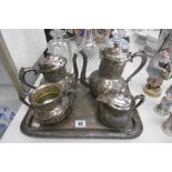 A FOUR PIECE SILVER PLATED TEA SET ON TRAY A/F